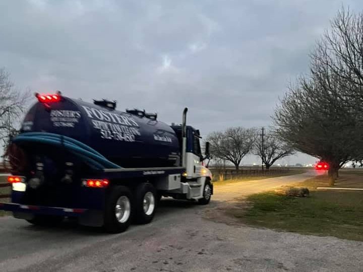 Foster&rsquo;s pump truck on a ranch road early in the morning